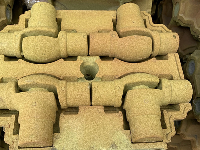 Kuidas lahendada liiva kleepuva defekti halli malmist osade tootmisel, kasutades kilega kaetud liivatehnoloogiat?